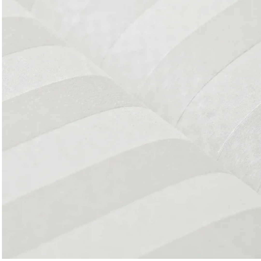 A close-up of Fitted Sheets For Elevra Beds - CloudWeave™ 100% Cotton shows soft, white fabric with alternating matte and satin-finish stripes, highlighting the luxurious elegance of these premium fitted sheets.